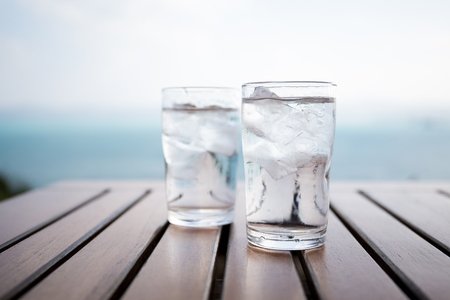 2 Glasses of Clean Water on Tabletop